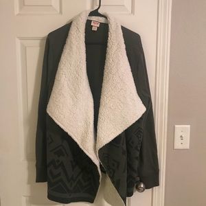 Green sweater with Aztec print